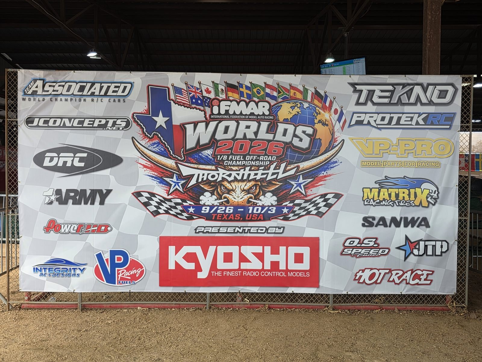 The official 2026 IFMAR 1/8 Fuel Off-Road World Championship sponsor banner at Thornhill Racing Circuit, printed by Integrity RC Designs.